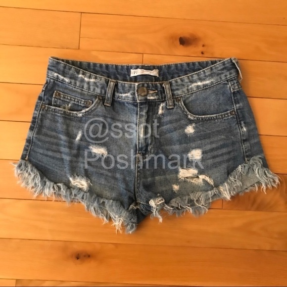 Free People Pants - Free people dolphin hem distressed jean shorts